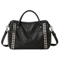 EYE Archive Astra Bag in black, studded faux leather pillow bag, front view