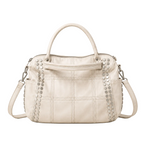EYE Archive Astra Bag in cream, studded faux leather pillow bag, front view