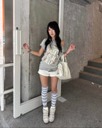 EYE Archive Astra Bag in cream styled with a summer outfit