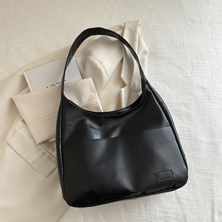 EYE Archive Commuter Shoulder Bag