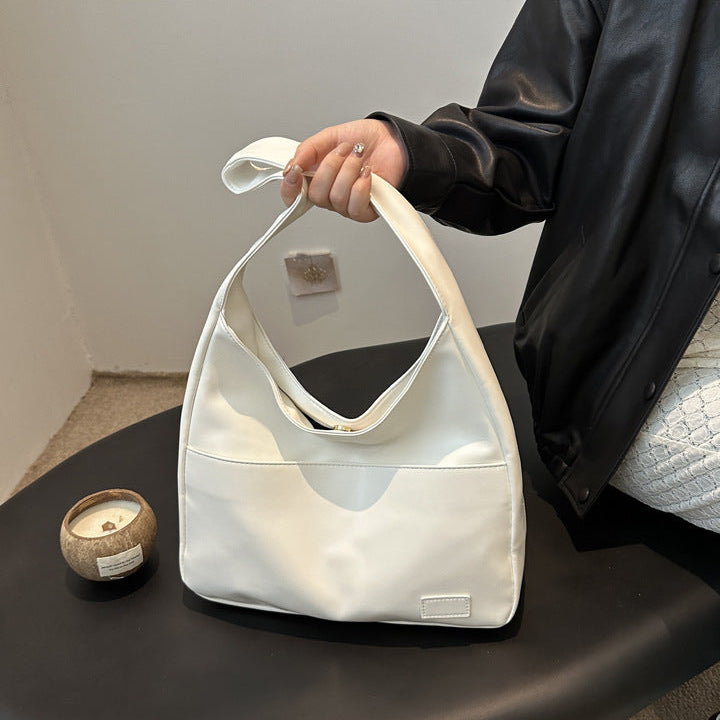 EYE Archive Commuter Shoulder Bag