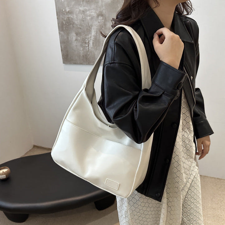 EYE Archive Commuter Shoulder Bag