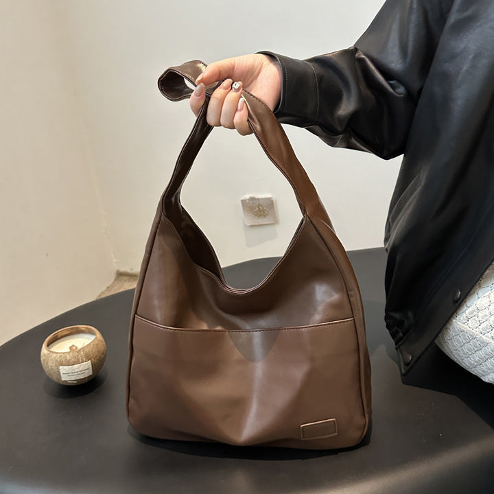 EYE Archive Commuter Shoulder Bag