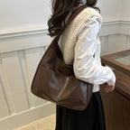EYE Archive Commuter Shoulder Bag