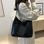 EYE Archive Commuter Shoulder Bag