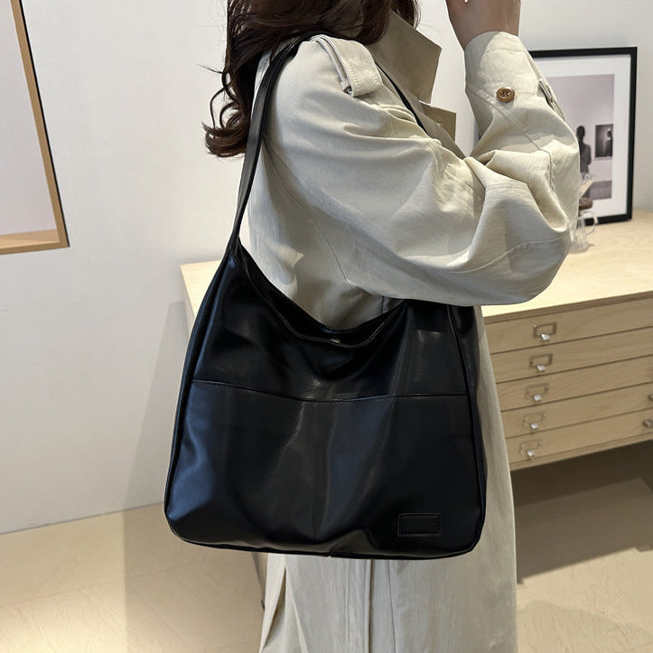 EYE Archive Commuter Shoulder Bag