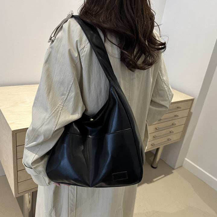 EYE Archive Commuter Shoulder Bag