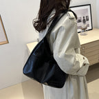 EYE Archive Commuter Shoulder Bag