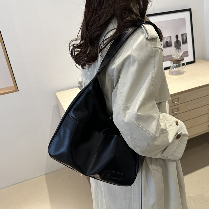 EYE Archive Commuter Shoulder Bag