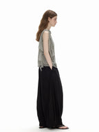 Side profile of the Cascade Top showing the loose cut and the gently curved hem