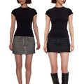 The black Essential Tee worn with a grey denim mini skirt