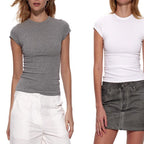 The Essential Tee shown in black, grey and white on three models