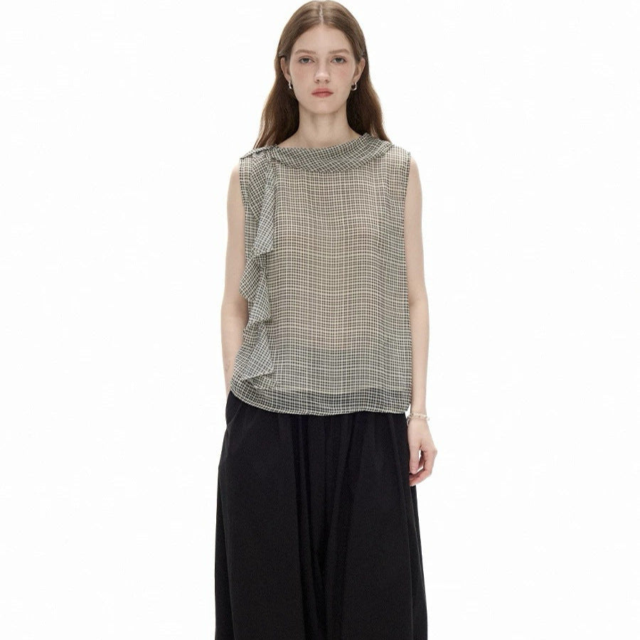 Full-length front view of the Cascade Top styled with black wide-leg trousers