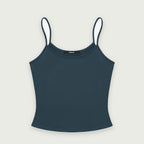 Flat product shot of the Studio Tank in deep teal blue