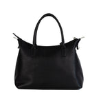 The Signature Tote with the handles down and the body relaxed